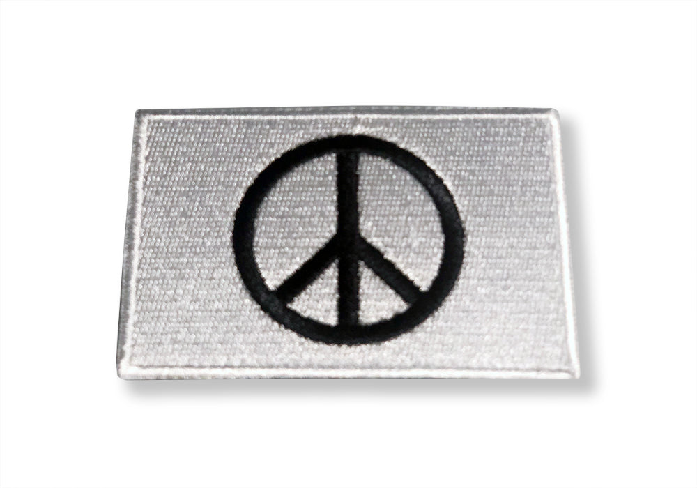 Sew-on peace sign patch showcasing durable stitching and colorful peace symbol design.